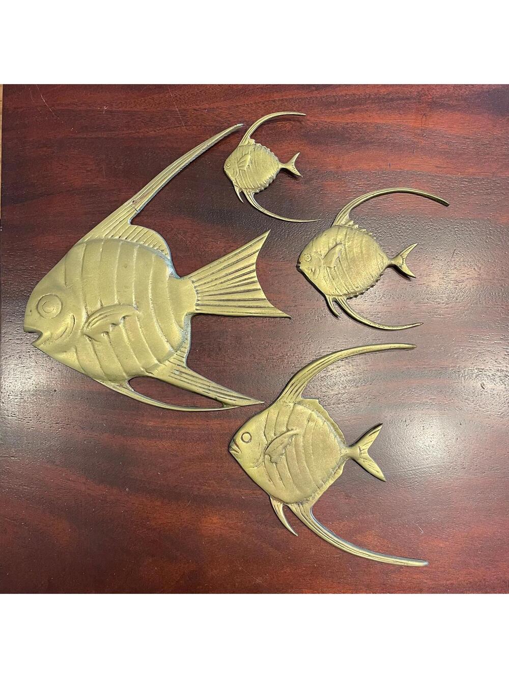 Four Brass Fish